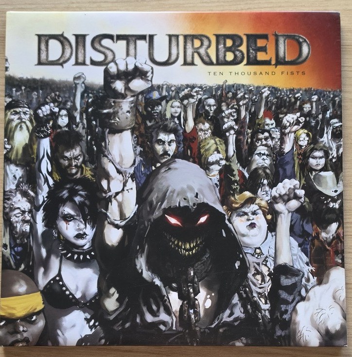 Capa de Disturbed — Ten Thousand Fists